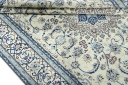 Close-up detail of 2000s Nain rug from Iran / Persia showing Wool weave