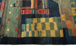 Close-up detail of 2000s Persian Gabbeh rug from Pakistan showing Wool weave