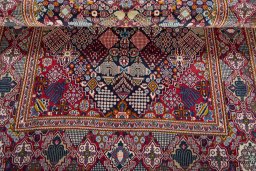 Close-up detail of 2000s Kashan rug from Iran / Persia showing Wool weave