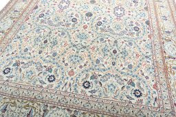 Central medallion detail of 1950s Kashan rug from Iran / Persia
