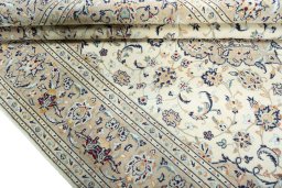 Close-up detail of New Kashan rug from Iran / Persia showing Wool weave
