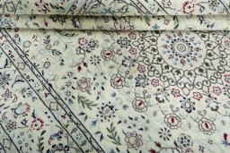 Close-up detail of 2000s Nain rug from Iran / Persia showing Wool weave