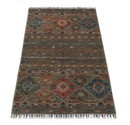 Surface texture of New Samarkand rug with natural Wool and intricate pattern