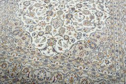 Close-up detail of 2000s Kashan rug from Iran / Persia showing Wool weave