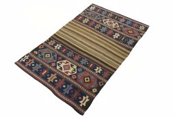 Corner detail of 1930s Kilim Ghashghai rug showing border pattern and Wool pile