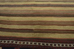 Backside of handmade 1930s Kilim Ghashghai rug showing knot structure and weave density