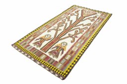 Corner detail of 2000s Kilim Ghashghai rug showing border pattern and Wool pile
