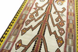 Surface texture of 2000s Kilim Ghashghai rug with natural Wool and intricate pattern