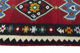Close-up detail of New Kilim Ghashghai rug from Iran / Persia showing Wool weave