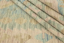 Close-up detail of New Kilim Traditional rug from Afghanistan showing Wool weave