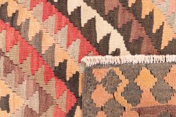 Close-up detail of 1989s Kilim Traditional rug from Iran / Persia showing Wool weave
