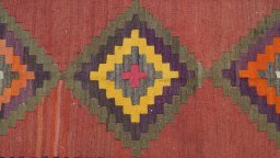 Close-up detail of 1990s Kilim Traditional rug from Iran / Persia showing Wool weave