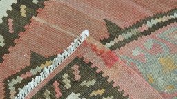 Close-up detail of New Kilim Traditional rug from Iran / Persia showing Wool weave