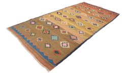 Close-up detail of New Kilim Traditional rug from Iran / Persia showing Wool weave