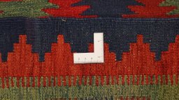 Full view of New Kilim Traditional rug from Iran / Persia, 375 × 145 cm in Multi Color tones