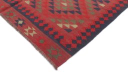 Backside of handmade New Kilim Traditional rug showing knot structure and weave density