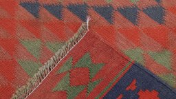 Close-up detail of New Kilim Traditional rug from Iran / Persia showing Wool weave