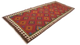 Close-up detail of New Kilim Traditional rug from Iran / Persia showing Wool weave