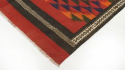 Backside of handmade New Kilim Traditional rug showing knot structure and weave density
