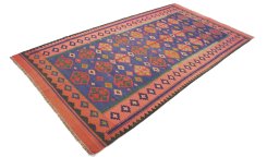 Close-up detail of New Kilim Traditional rug from Iran / Persia showing Wool weave
