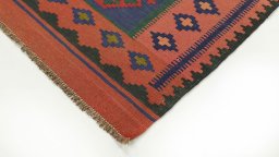 Backside of handmade New Kilim Traditional rug showing knot structure and weave density