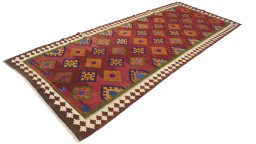 Close-up detail of New Kilim Traditional rug from Iran / Persia showing Wool weave