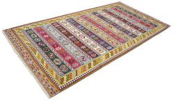 Close-up detail of New Kilim Traditional rug from Iran / Persia showing Wool weave