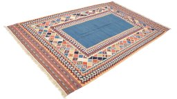 Close-up detail of New Kilim Traditional rug from Iran / Persia showing Wool weave