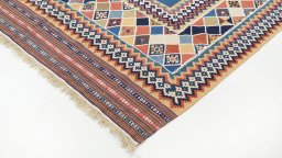 Backside of handmade New Kilim Traditional rug showing knot structure and weave density