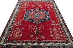 Surface texture of 2000s Sirjan rug with natural Wool and intricate pattern