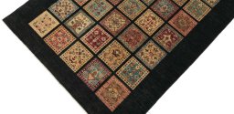 Backside of handmade New Farahan rug showing knot structure and weave density