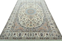 Surface texture of 2000s Nain rug with natural Wool and intricate pattern