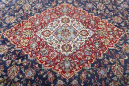 Central medallion detail of New Kashan rug from Iran / Persia