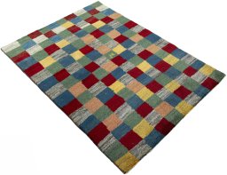 Close-up detail of 2000s Persian Gabbeh rug from Pakistan showing Wool weave