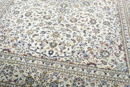 Close-up detail of 2000s Kashan rug from Iran / Persia showing Wool weave