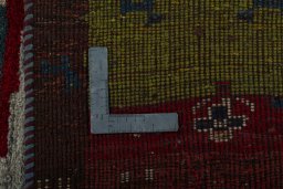 Close-up detail of 2000s Persian Gabbeh rug from Pakistan showing Wool weave