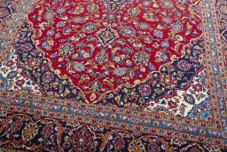 Close-up detail of 2000s Kashan rug from Iran / Persia showing Wool weave