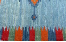 Close-up detail of New Kilim Sofre rug from Turkey showing Wool weave