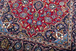Close-up detail of 2000s Kashan rug from Iran / Persia showing Wool weave