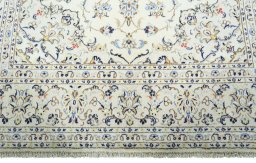 Full view of 2000s Kashan rug from Iran / Persia, 298 × 189 cm in Beige tones