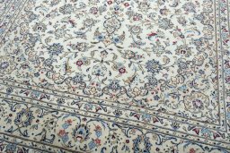 Close-up detail of 2000s Kashan rug from Iran / Persia showing Wool weave