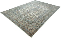 Corner detail of 2000s Yazd rug showing border pattern and Wool pile