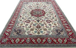 Surface texture of 2000s Sarough rug with natural Wool and intricate pattern