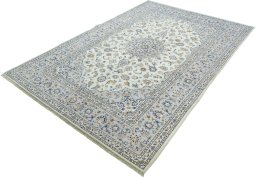 Corner detail of New Kashan rug showing border pattern and Wool pile