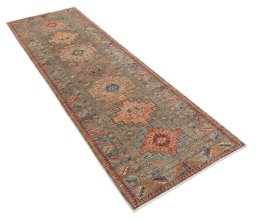 Corner detail of New Kazak rug showing border pattern and Wool pile
