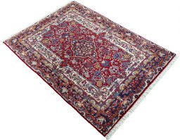 Close-up detail of 2000s Jozan rug from Iran / Persia showing Wool weave
