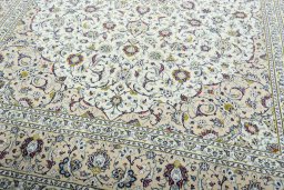 Close-up detail of 2000s Kashan rug from Iran / Persia showing Wool weave