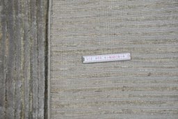 Backside of handmade New Mahli rug showing knot structure and weave density