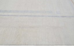 Backside of handmade New Mahli rug showing knot structure and weave density
