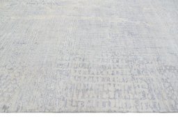 Backside of handmade New Mahli rug showing knot structure and weave density